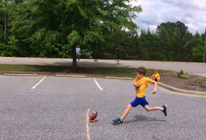 Scout Olympics football kick