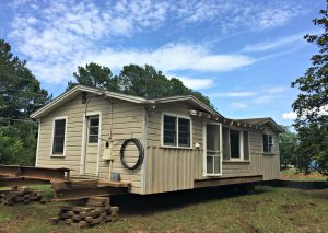 At the Top of the Lot - House Mover